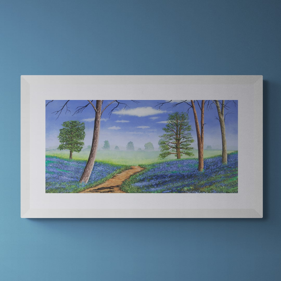 A picture by Jim Simpson called A Carpet of Bluebells in a white frame